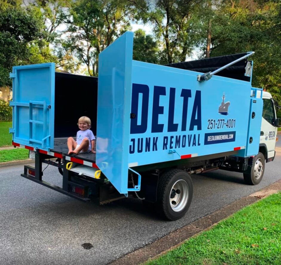 Delta Junk Removal truck parked in a Gulf Coast neighborhood